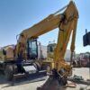 CAT WHEEL EXCAVATOR – M318