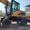 CAT WHEEL EXCAVATOR – M318