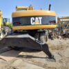 CAT WHEEL EXCAVATOR – M318