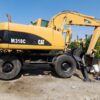 CAT WHEEL EXCAVATOR – M318